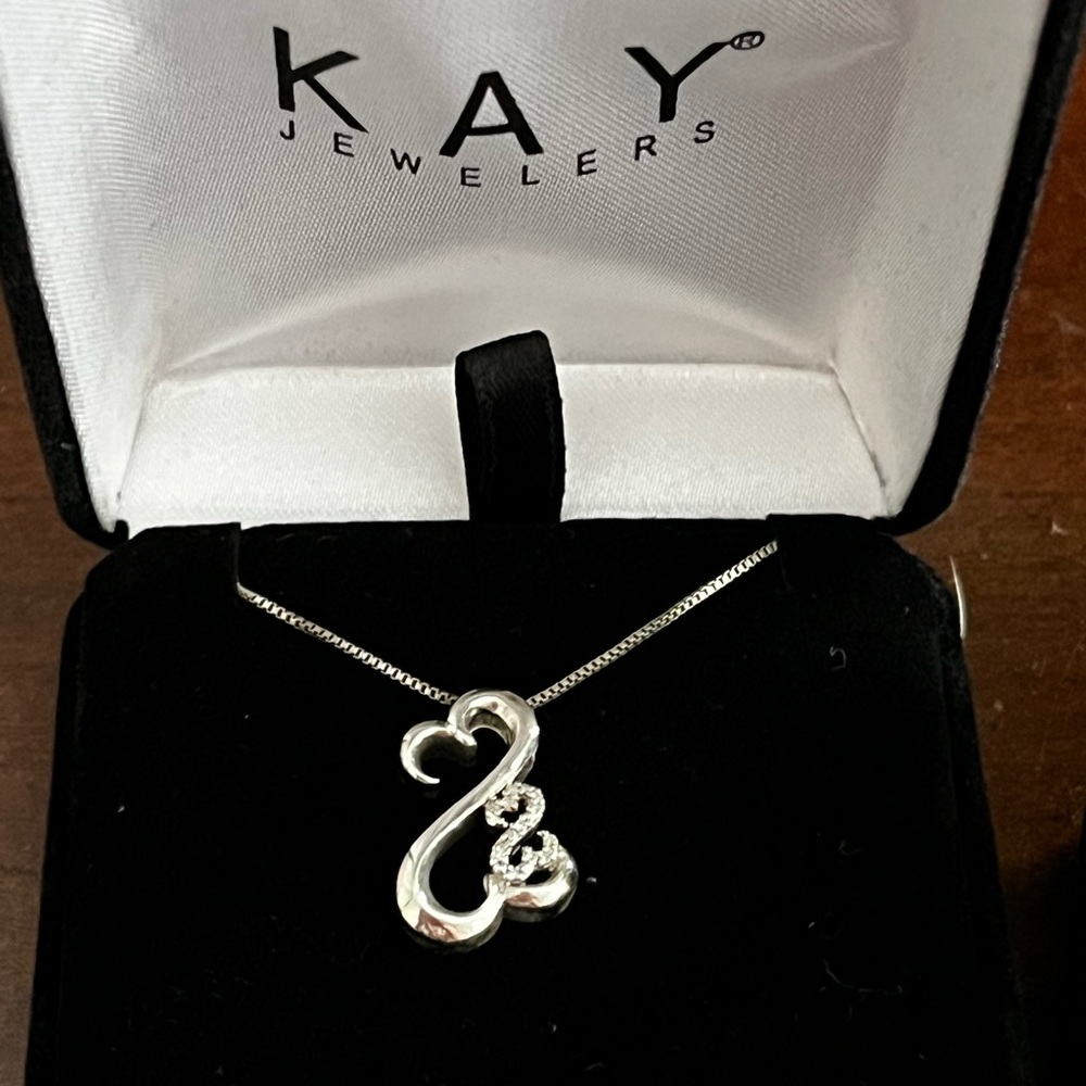 Retired design Kay Jewelers white diamond sterling silver pendant with chain